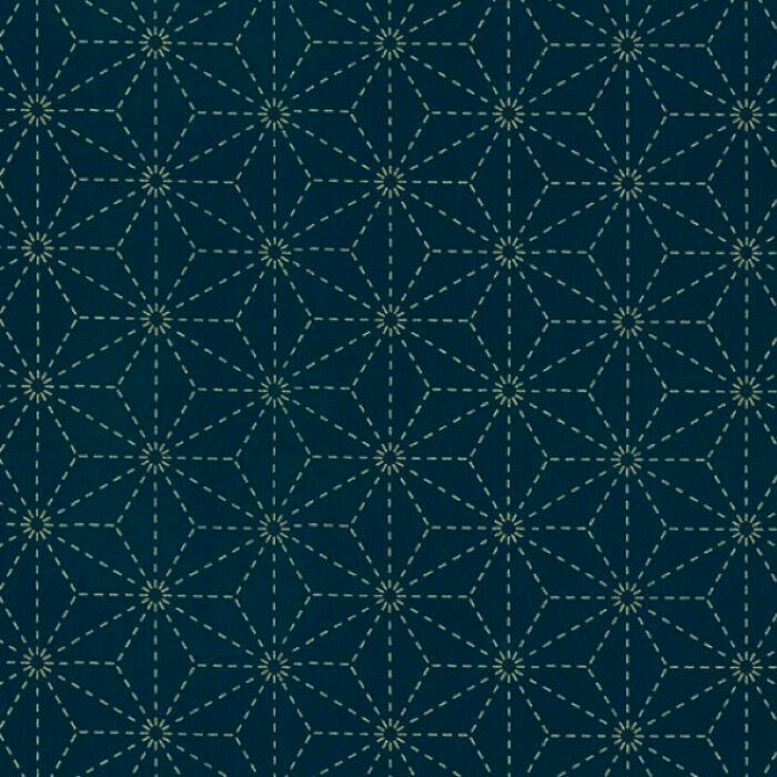 Angular leaf pattern on blue fabric.