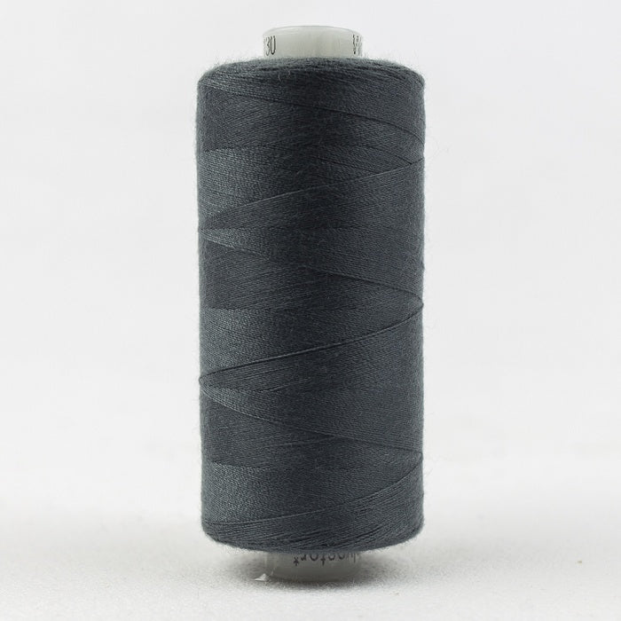 Spool of dark grey thread with Designer branding.