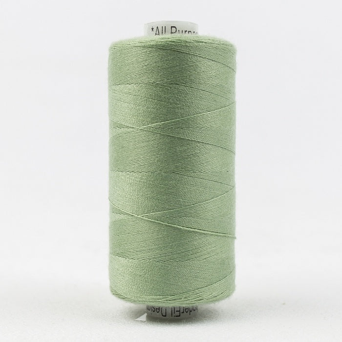 Spool of pale green thread with Designer branding.