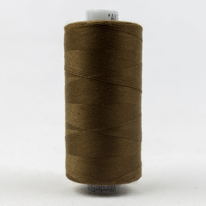 Spool of dark brown thread with Designer branding.