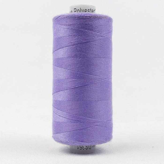 Spool of light purple thread with Designer branding.