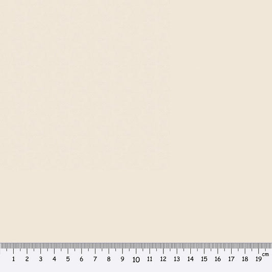 Light beige fabric swatch with a ruler at the bottom for scale.
