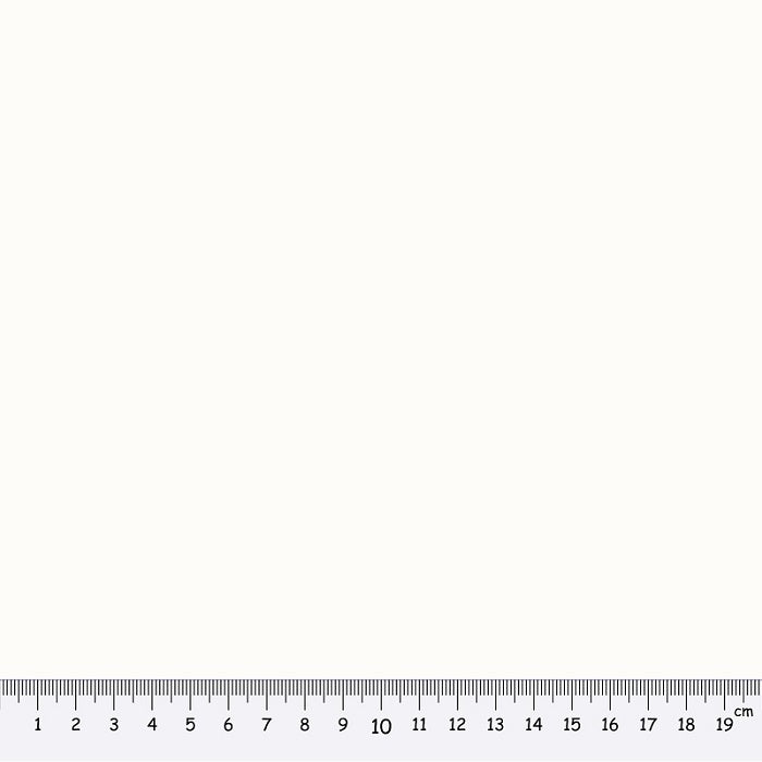 Off white fabric swatch with a ruler at the bottom for scale.