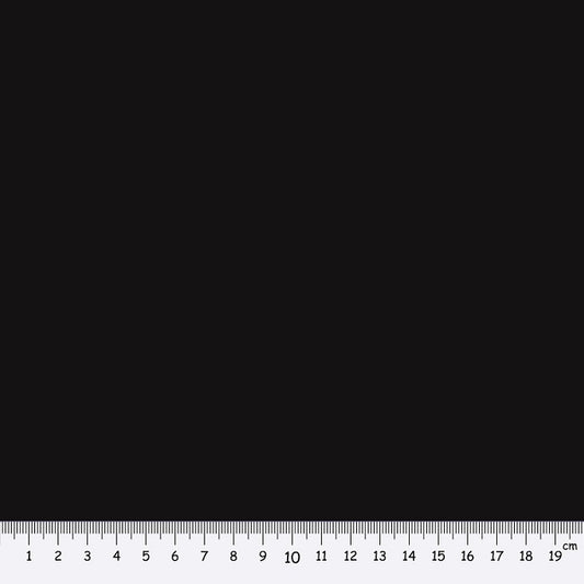 Black fabric swatch with a ruler at the bottom for scale.
