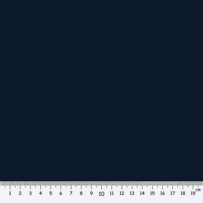 Navy fabric swatch with a ruler at the bottom for scale.