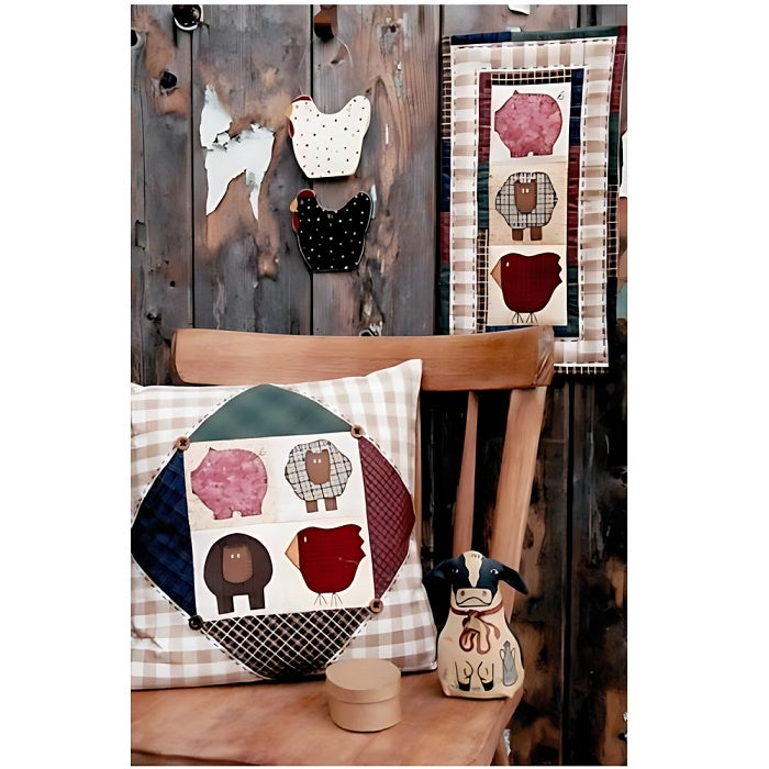 Cushion and wall hanging with country animals applique.