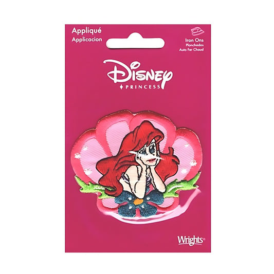 Applique of Disney princess Ariel in a pink shell.