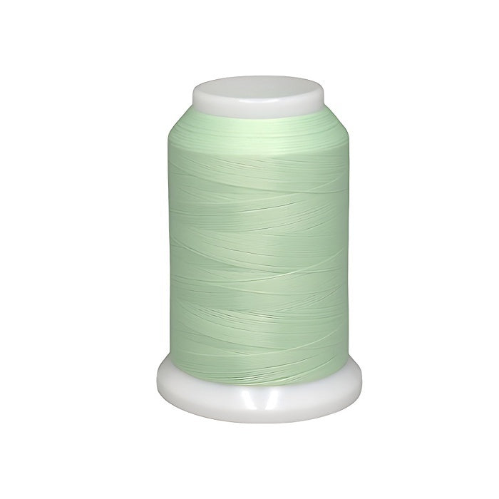 Spool of light green woolly nylon thread.