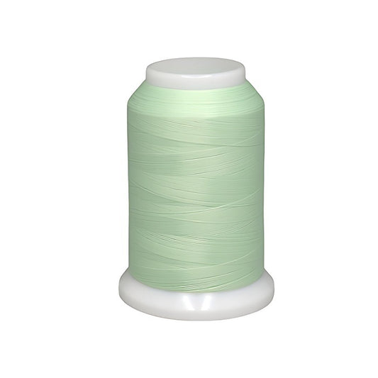 Spool of light green woolly nylon thread.