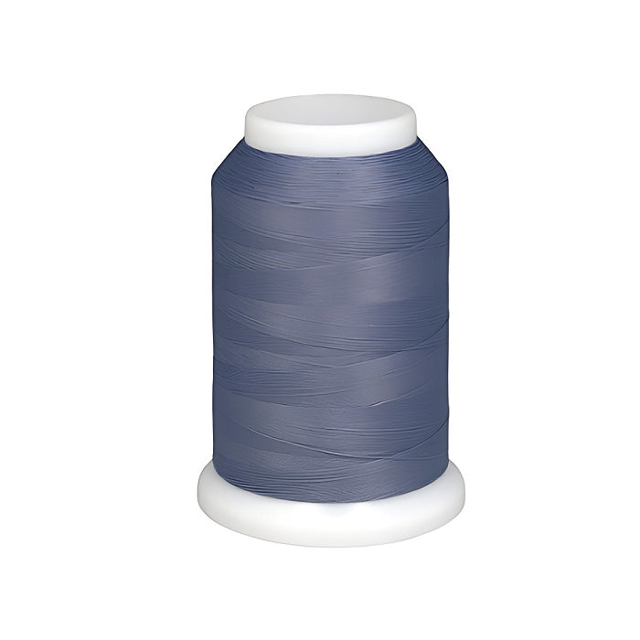 Spool of grey woolly nylon thread.