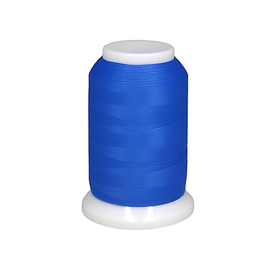 Spool of bright blue woolly nylon thread.