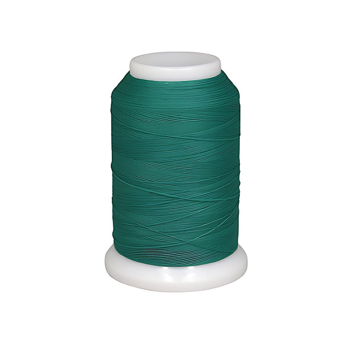 Spool of green woolly nylon thread.