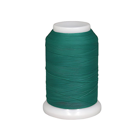 Spool of green woolly nylon thread.