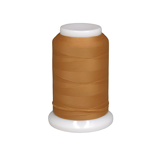 Spool of tan brown woolly nylon thread.