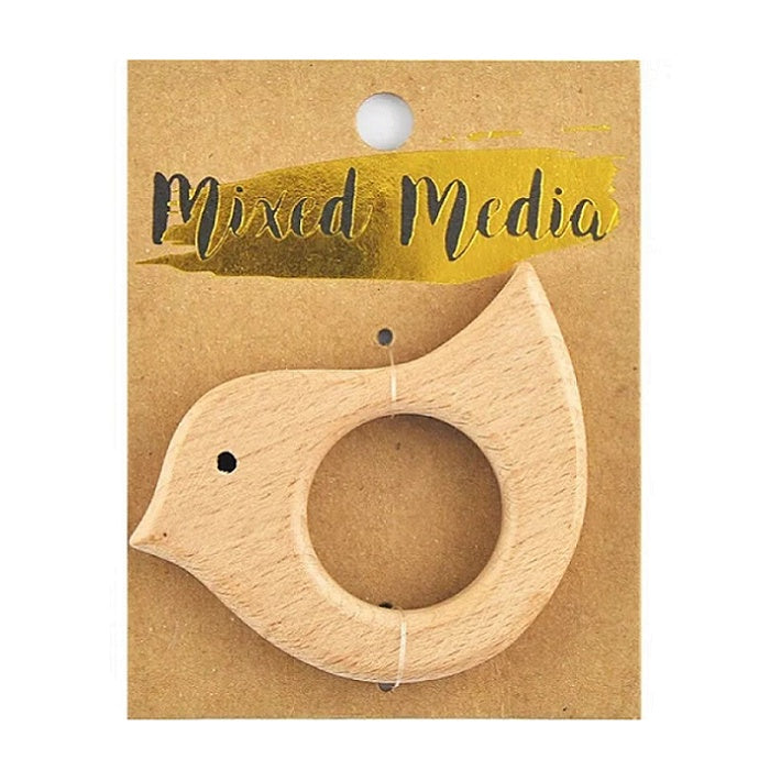 Wooden bird shaped ring on cardboard backing.