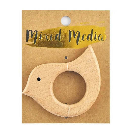 Wooden bird shaped ring on cardboard backing.