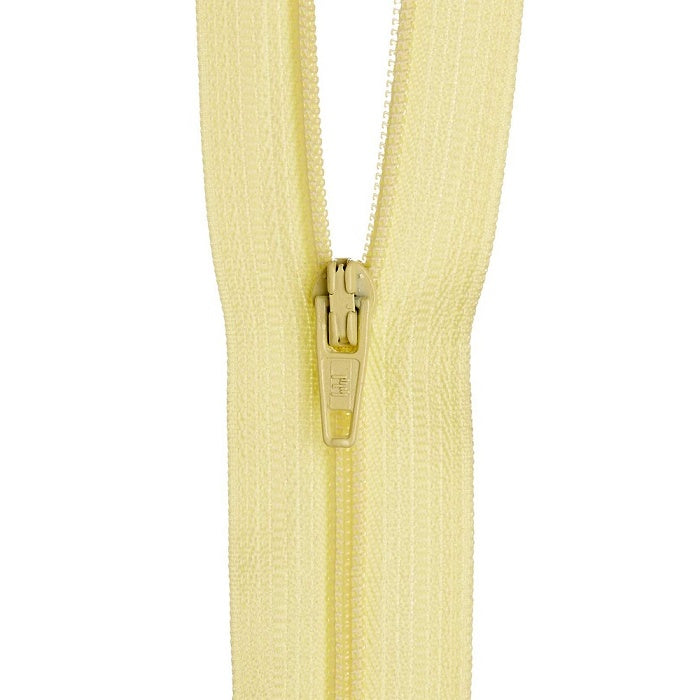 Pale yellow nylon dress zip.