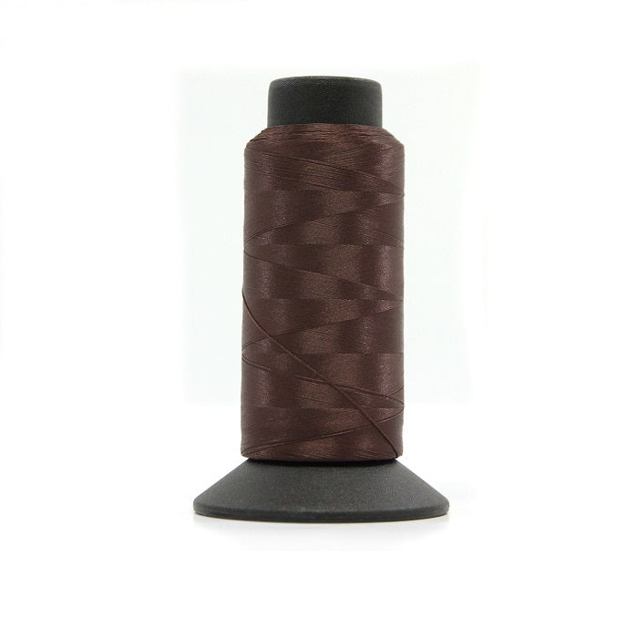 Cone of brown woolly nylon thread.
