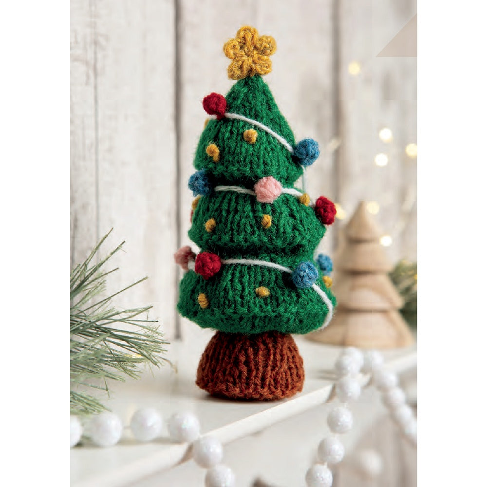Knitted Christmas tree with a green body and colourful yarn ornaments.