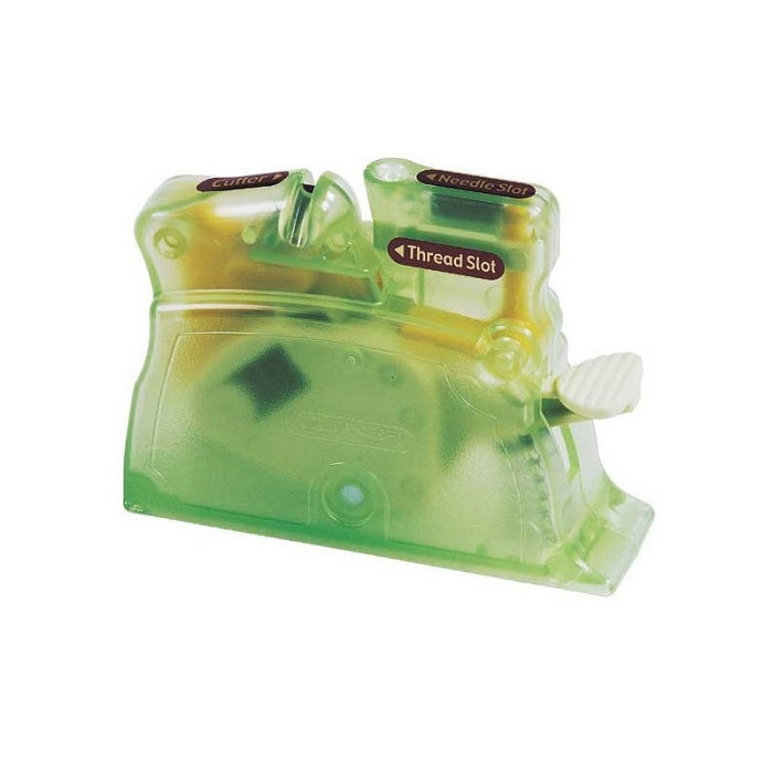 Green desk needle threader.