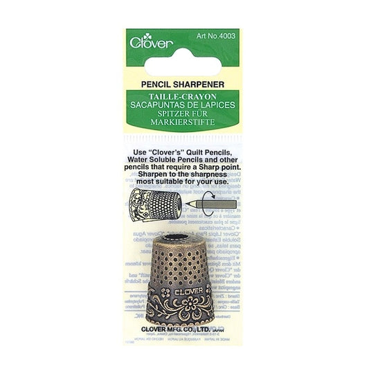 Packaged thimble shaped pencil sharpener with Clover branding.