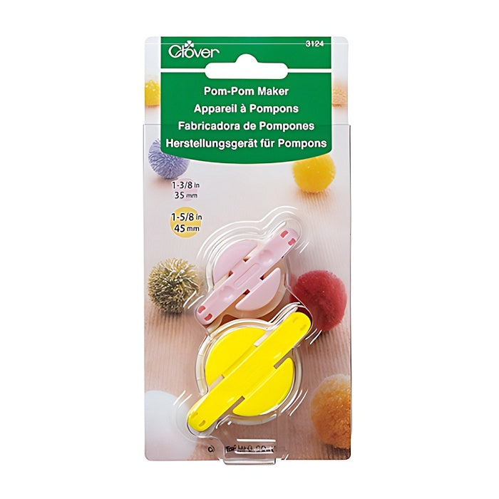 Packaged pom pom makers in pink and yellow.