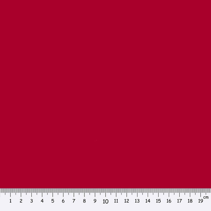 Homespun fabric swatch in dark red.