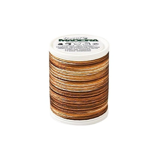 Spool of brown variagated thread with Madeira branding.
