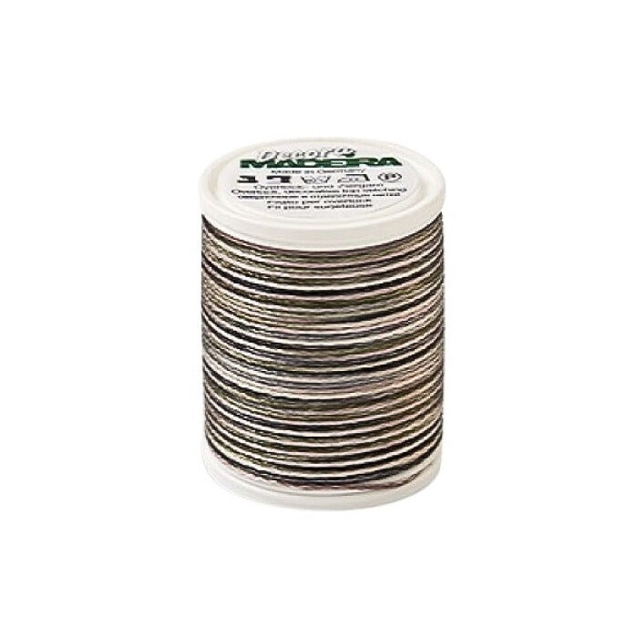 Spool of black variagated thread with Madeira branding.