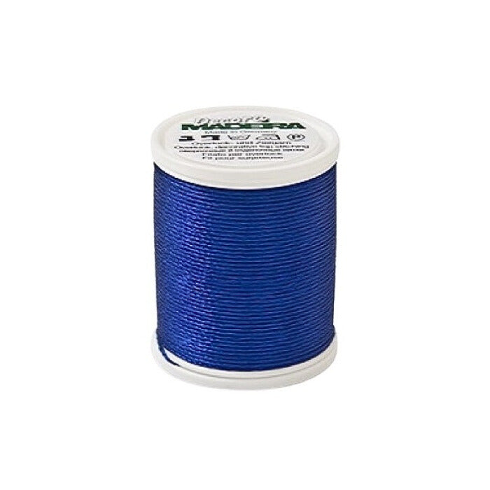 Spool of blue thread with Madeira branding.