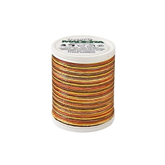 Spool of brown variagated thread with Madeira branding.
