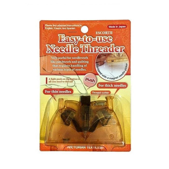 Packaged desk needle threader with Victorian Textiles branding.