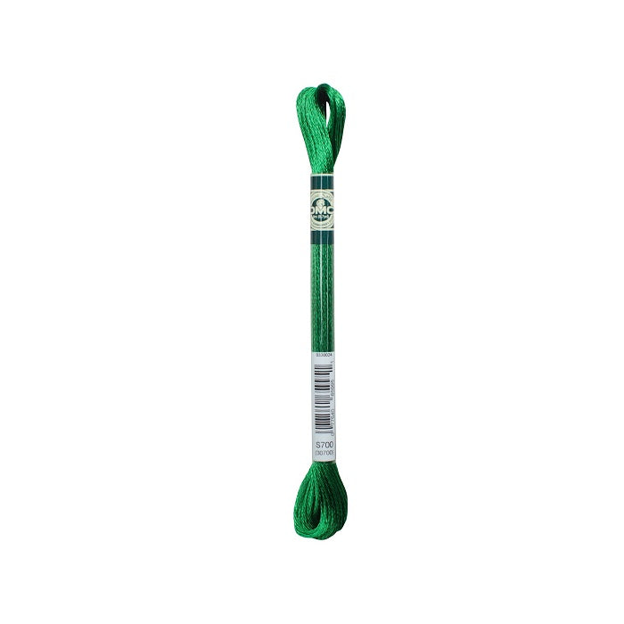 Skein of green embroidery floss with DMC branding.