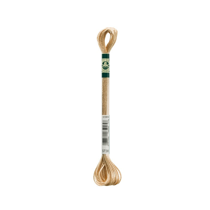 Skein of beige embroidery floss with DMC branding.