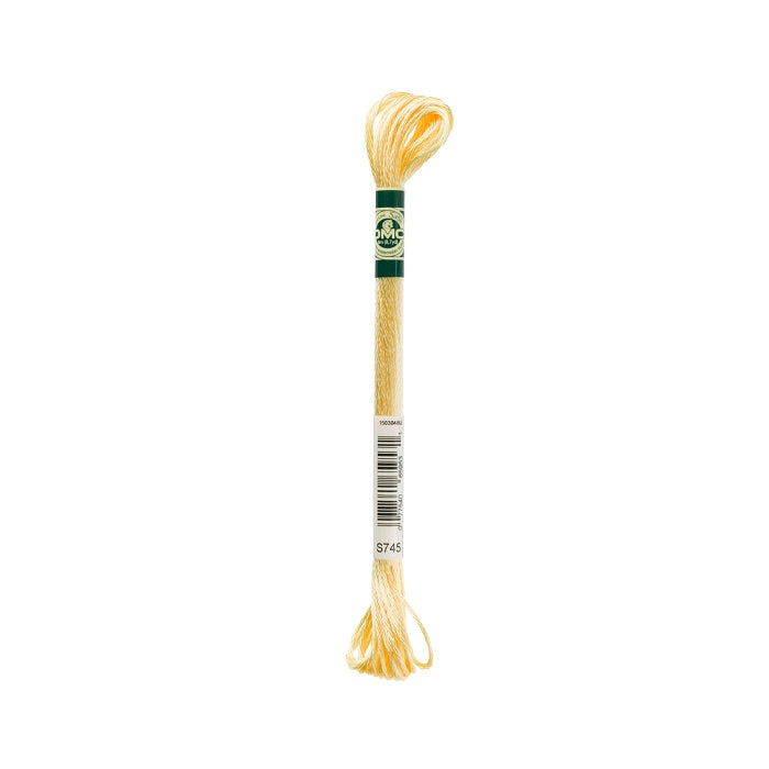 Skein of light yellow embroidery floss with DMC branding.