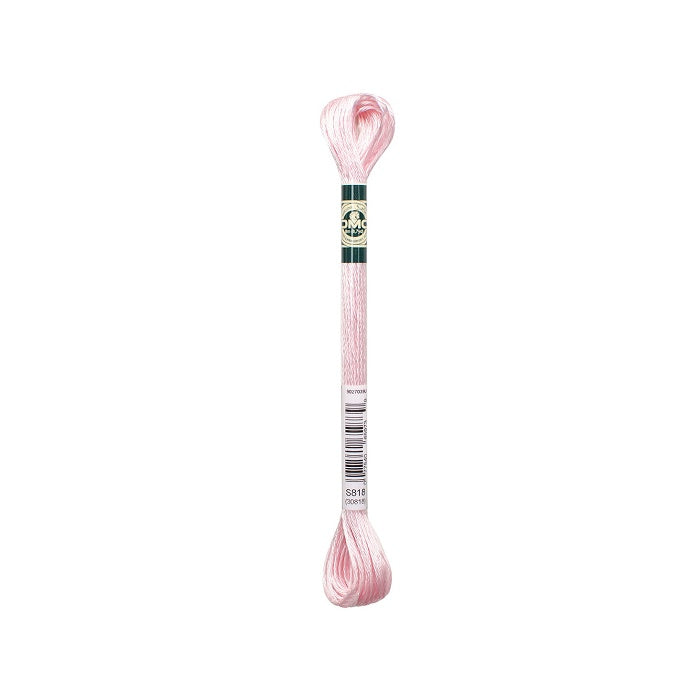 Skein of light pink embroidery floss with DMC branding.