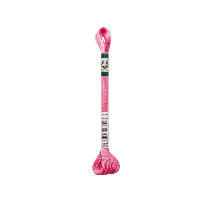 Skein of pink embroidery floss with DMC branding.