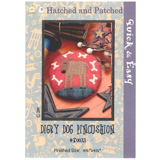 Pattern cover of pincushion with appliqued dog and bones.
