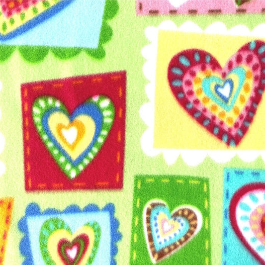 Fleece fabric with colourful hearts.