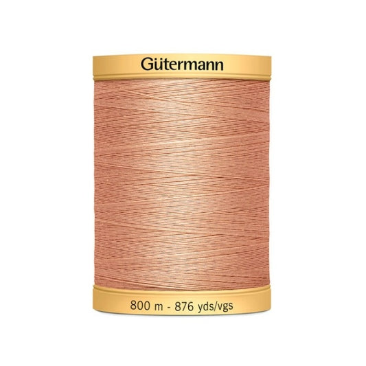 Spool of salmon pink thread with Gutermann 800m branding.