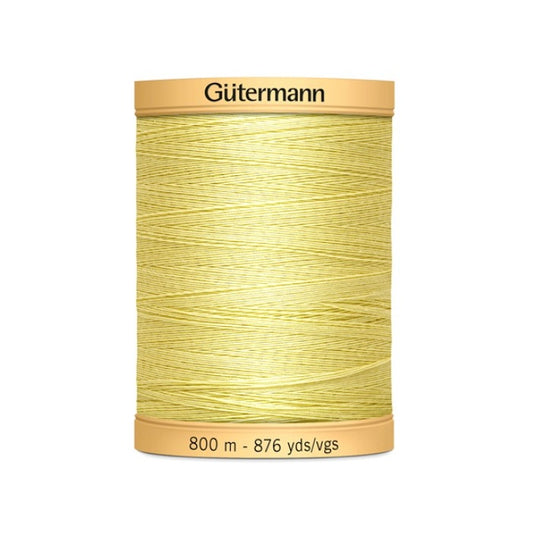 Spool of yellow thread with Gutermann 800m branding.