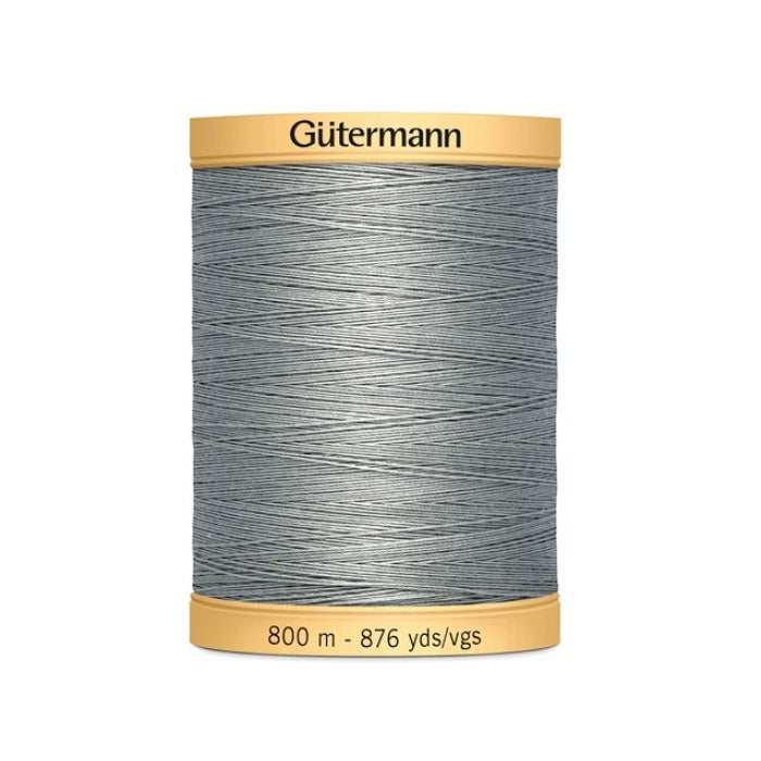 Spool of grey cotton thread with Gutermann 800m branding.