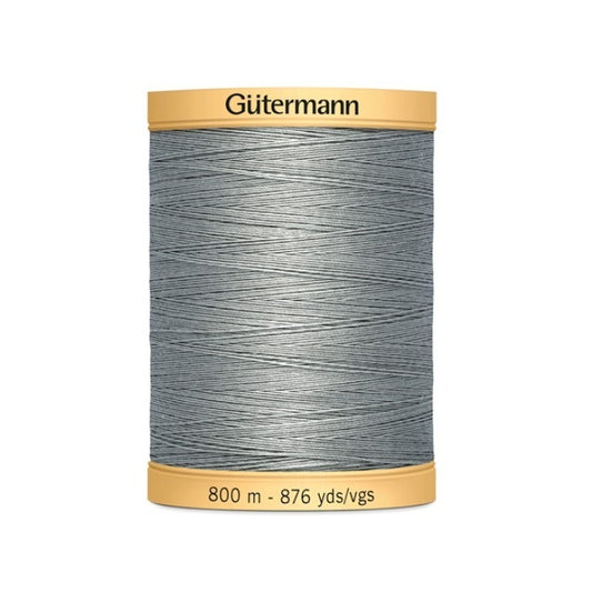 Spool of grey cotton thread with Gutermann 800m branding.
