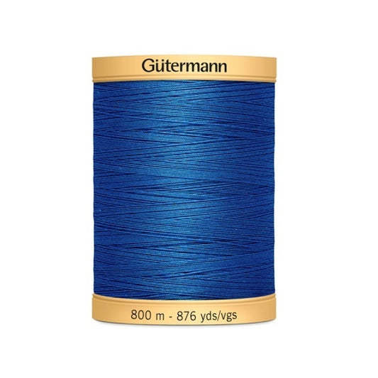 Spool of dark blue thread with Gutermann 800m branding.
