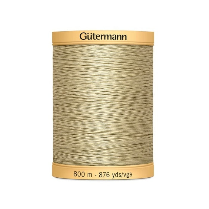 Spool of beige thread with Gutermann 800m branding.