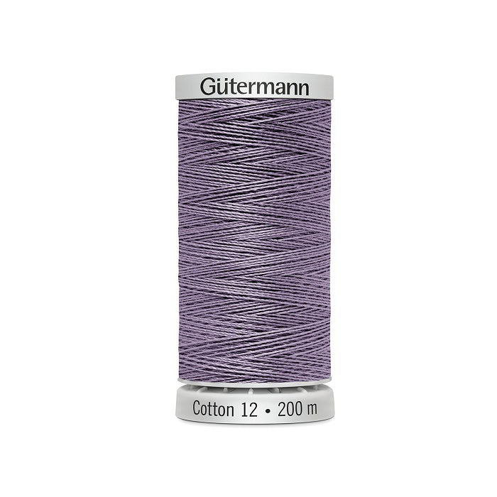 Spool of dark mauve thread with Gutermann Cotton 12 branding.