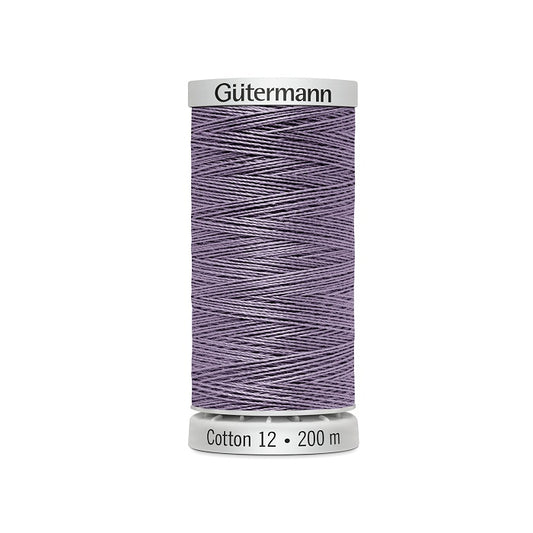 Spool of dark mauve thread with Gutermann Cotton 12 branding.