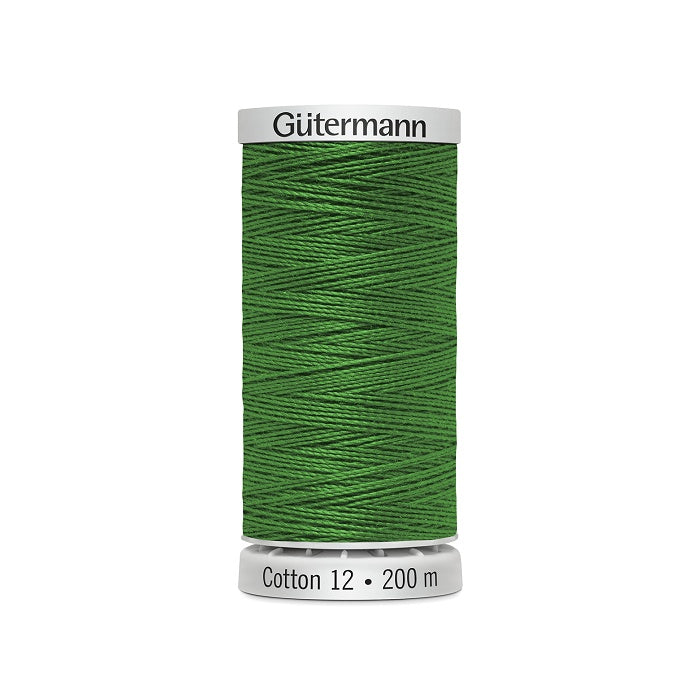 Spool of dark green thread with Gutermann Cotton 12 branding.