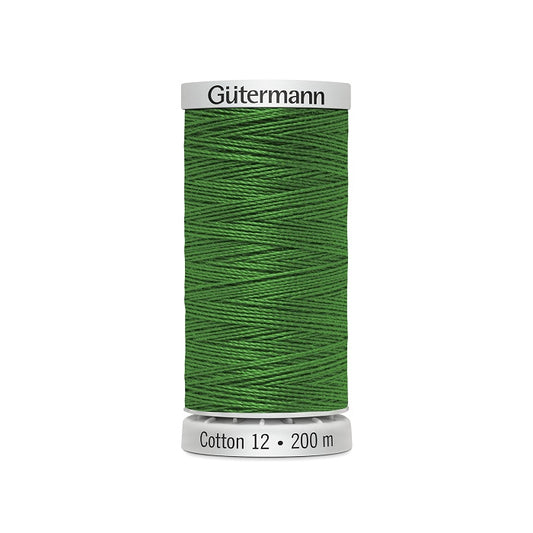 Spool of dark green thread with Gutermann Cotton 12 branding.