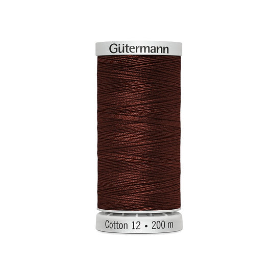 Spool of dark rich brown thread with Gutermann Cotton 12 branding.